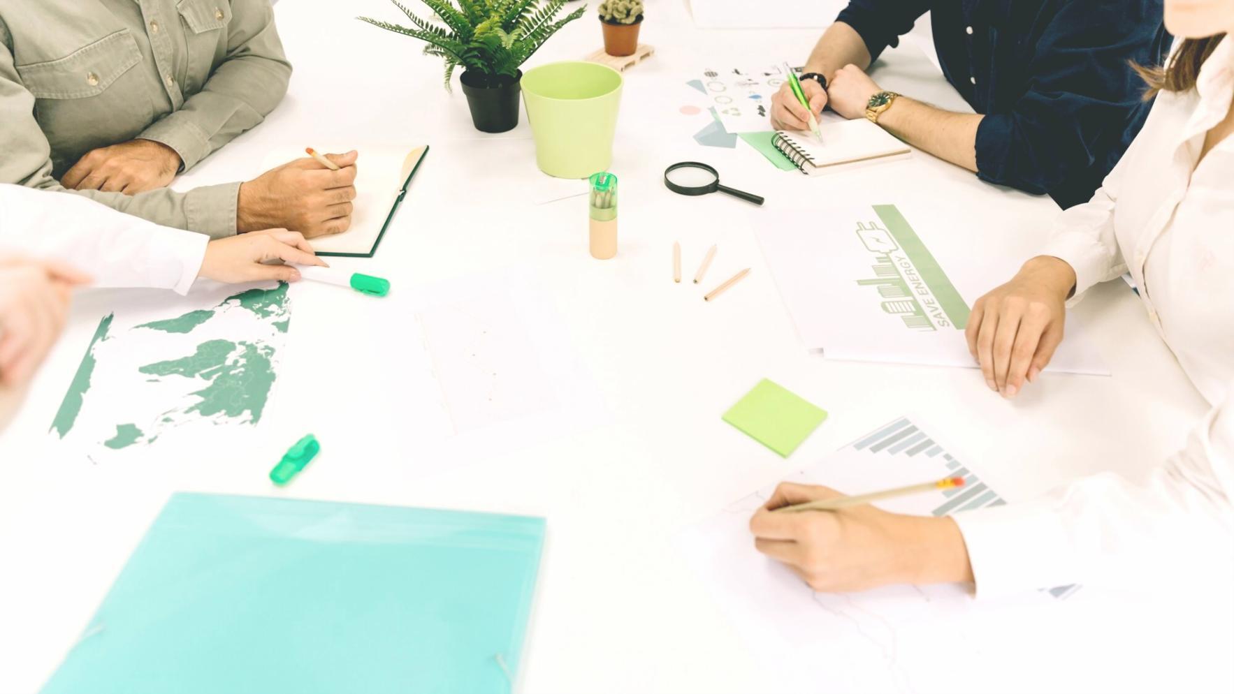Person reviewing financial documents during initial consultation phase